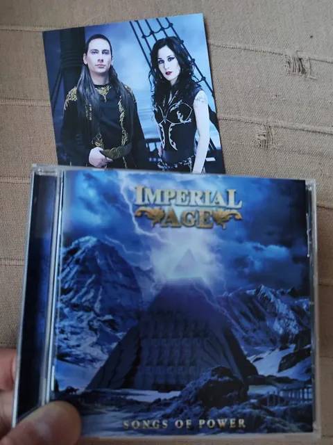 A fan smiling with the CD